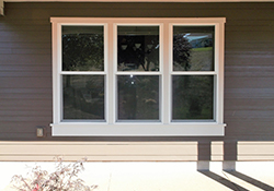 Three paned window and exterior siding