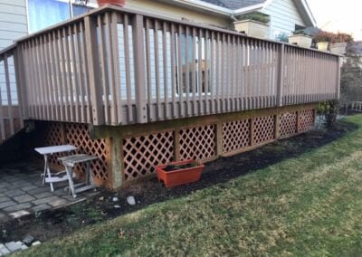 Newly built house deck with wood railing