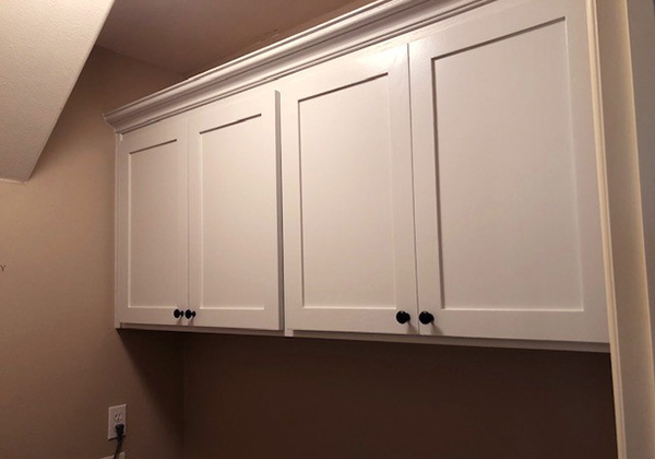 Cabinetry above washer dryer space