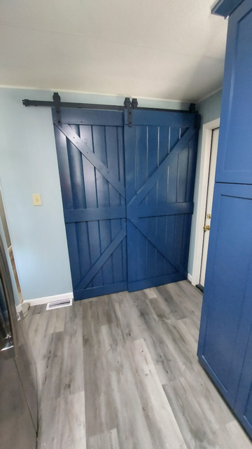 Blue sliding door installed